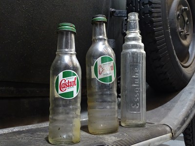 Lot 3 - Three glass oil bottles