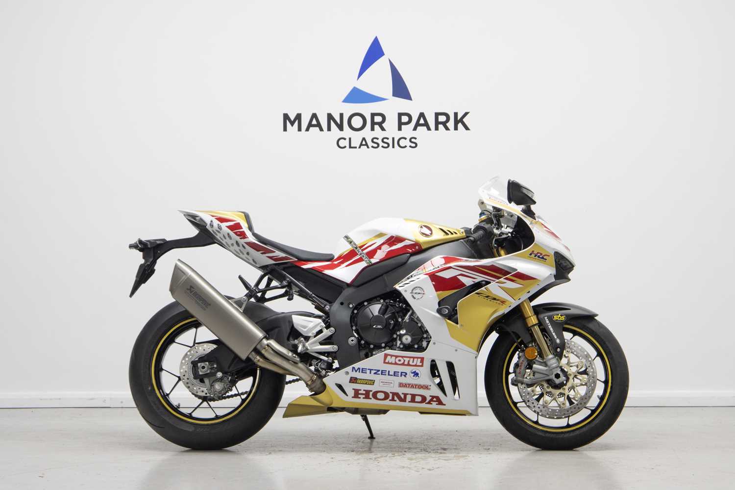 Lot 30 - 2023 Honda CBR1000RR-R Fireblade SP John McGuinness 100th Start TT Replica