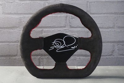 Lot 49 - Nigel Mansell signed replica Ferrari alcantara steering wheel full size with authenticity