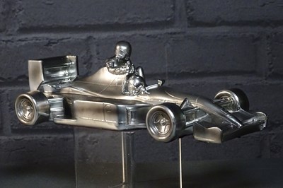 Lot 50 - Nigel Mansell chromed “Taxi for Senna” 1/18th sculpture signed with authenticity